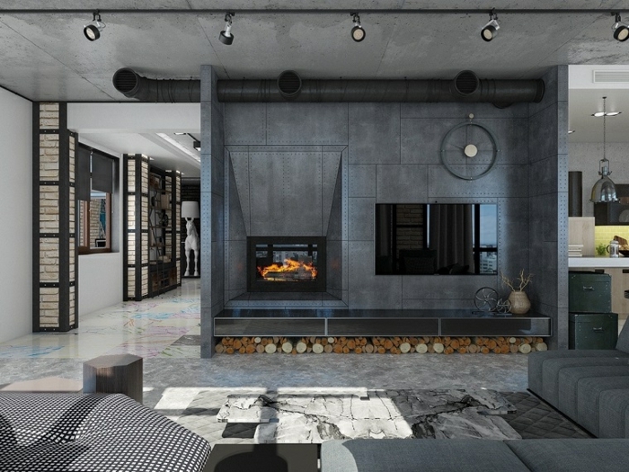 meuble industriel, colonne décorative en briques et fer, carrelage multicolore, canapé d'angle gris, cheminée noire