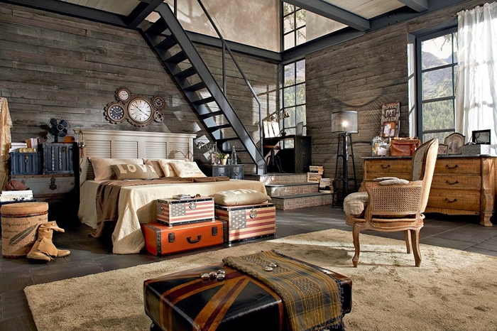 meuble industriel, escalier noir, murs en pierre, tête de lit en bois, horloge avec mécanisme, tapis moelleux, idee deco industrielle