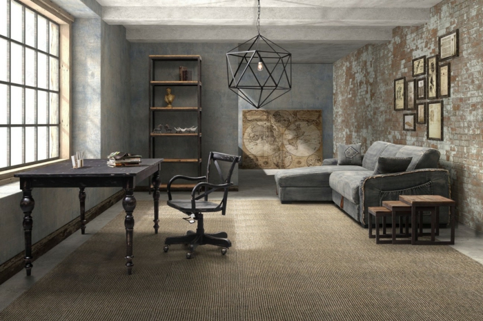 meuble industriel, table noire, idee deco industrielle, tapis beige, canapé d'angle gris, carte ancienne, mur en briques