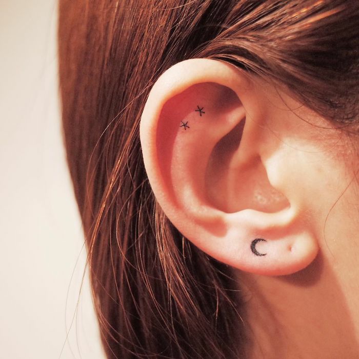 Le plus beau tatouage du monde femme quel tattoo choisir minimaliste tatouage sut l oreille