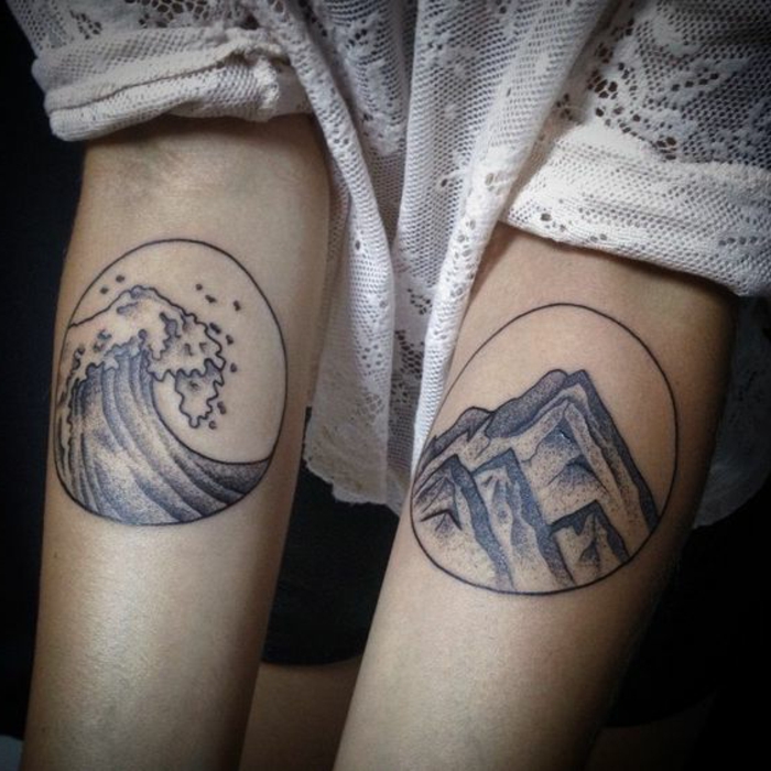 tatouage fin femme, paysages illustrés sur les deux bras, vagues de mer et montagne