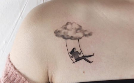 tatouage nuage reverie fille balancoire tete dans le ciel