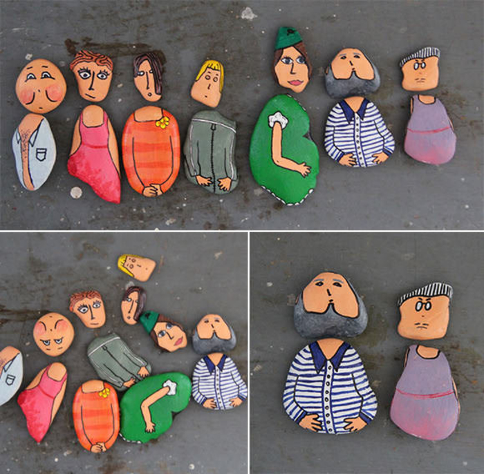 un jeu d'enfant avec des galets peints comme des personnages rigolos 