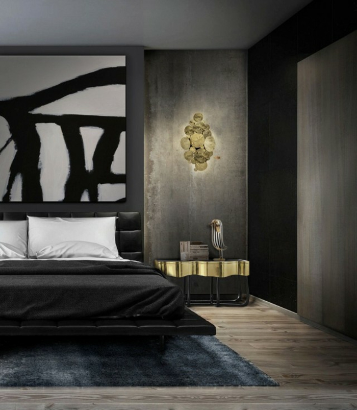 chambre design de luxe aux accents dorés avec des murs gris et panneau décoratif en noir et blanc