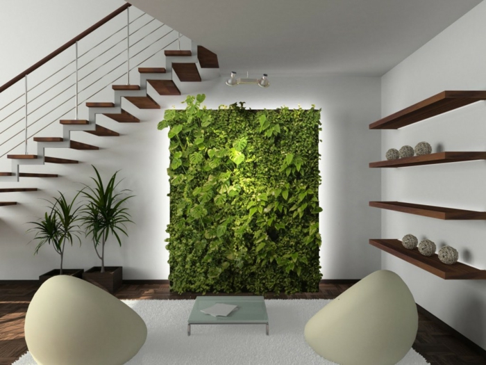 déco de jardin zen a l intérieur d une maison moderne écolo, un mur en végétation verte, plantes dans des pots, tapis et fauteuils blancs