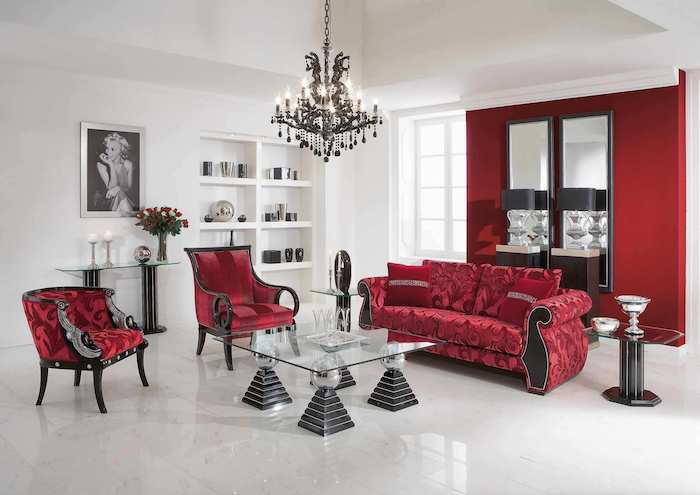 idée interieur salon baroque, avec canapé et fauteuils rouges, quelle couleur va avec le rouge, mur d accent rouge carrelage et murs blancs, bibliothèque blanche, lustre baroque
