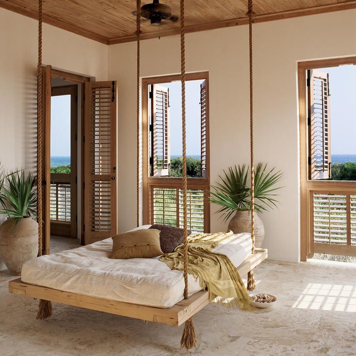 un lit flottant en palette dans une chambre à coucher moderne de style méditerranéen, idee avec des palettes pour une déco authentique et éco responsable