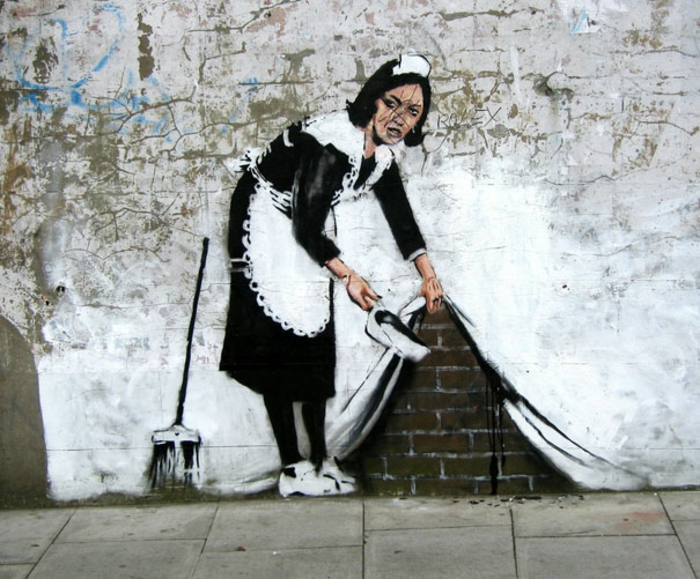 Street art Bansky graffiti dessiner une femme de profil dessin humoristique maitre