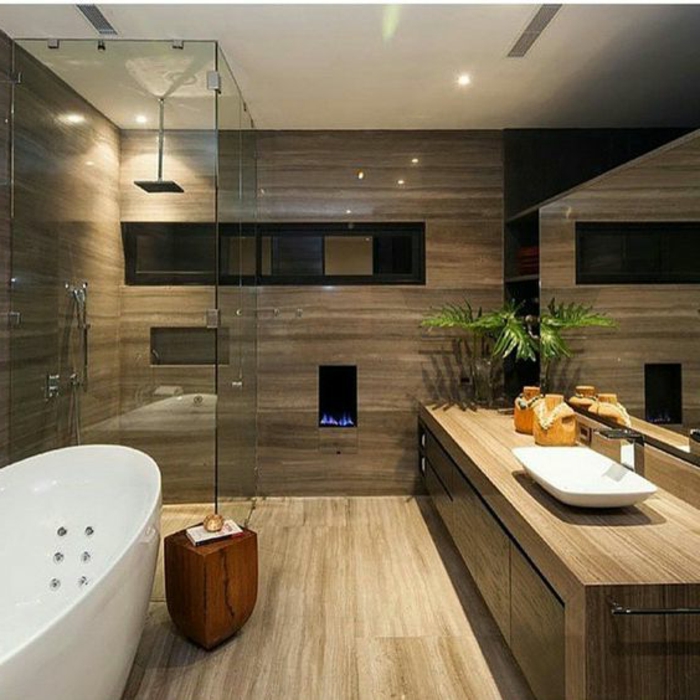 salle de bain zen, meuble sous vasque styé en bois, sol en bois, baignoire luisante blanche