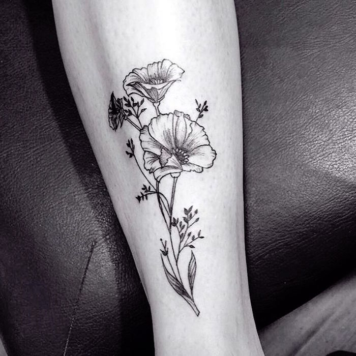 tattoo symbole coquelicot et dessin tatouage de fleur en noir et blanc