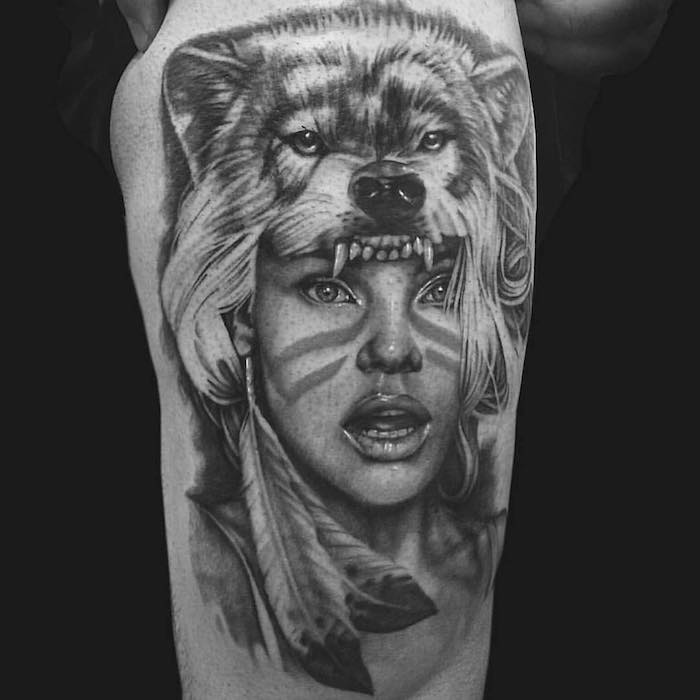 homme tatoué, dessin en encre avec viage femme tête de loup, idée tatouage symbolique