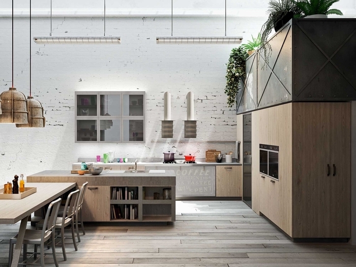 une cuisine d'ambiance loft industriel ensoleillée et spacieuse avec des murs en briques blanches et des luminaires d'usine