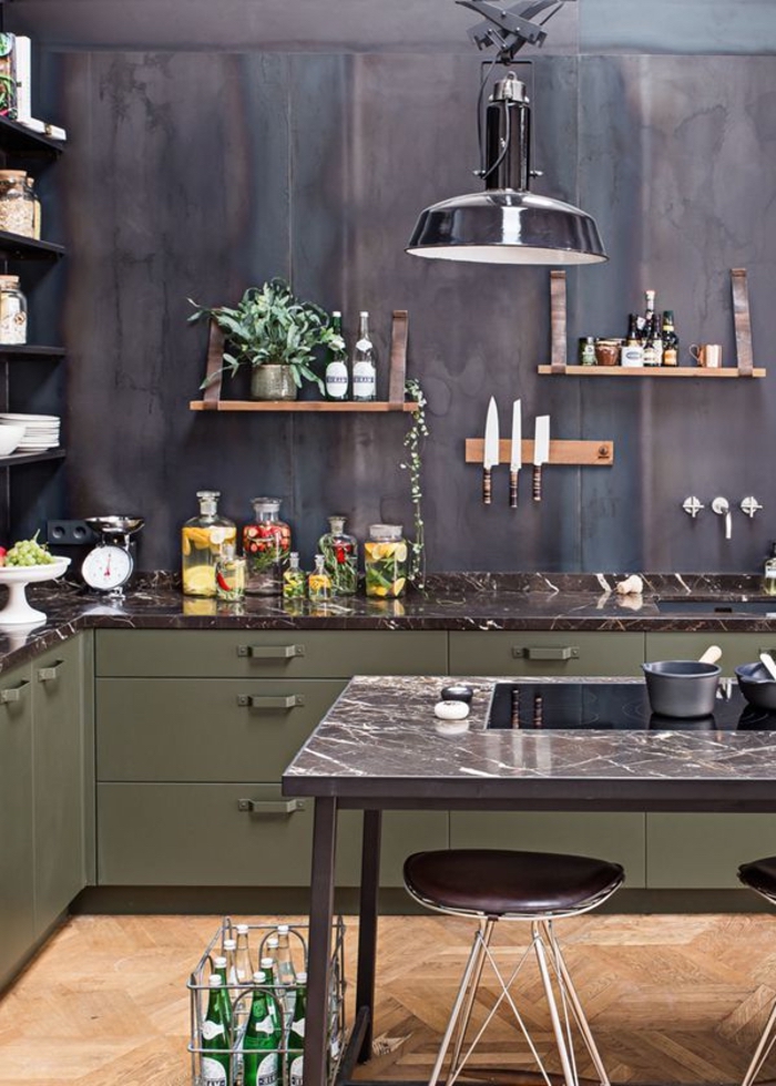 l'esthétique sobre et élégante de la deco industrielle dans une cuisine en noir et vert