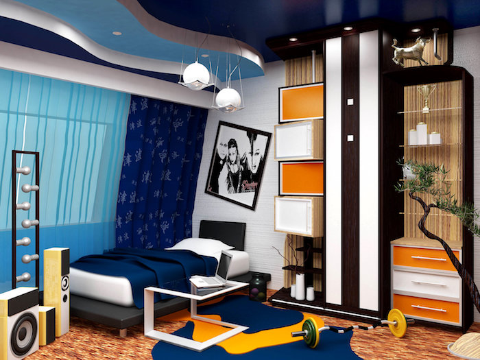 meuble chambre enfant, tapis orange à lignes marron et blanc, lampes suspendues à finitions métalliques