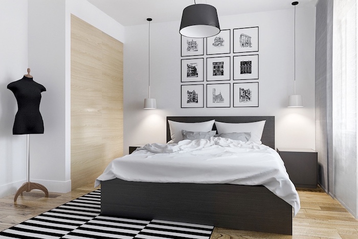 chambre gris et blanc, parquet clair, lit bois avec linge de it gris et blanc, deco murale dessins graphiques, tapis rayures noir et blanc