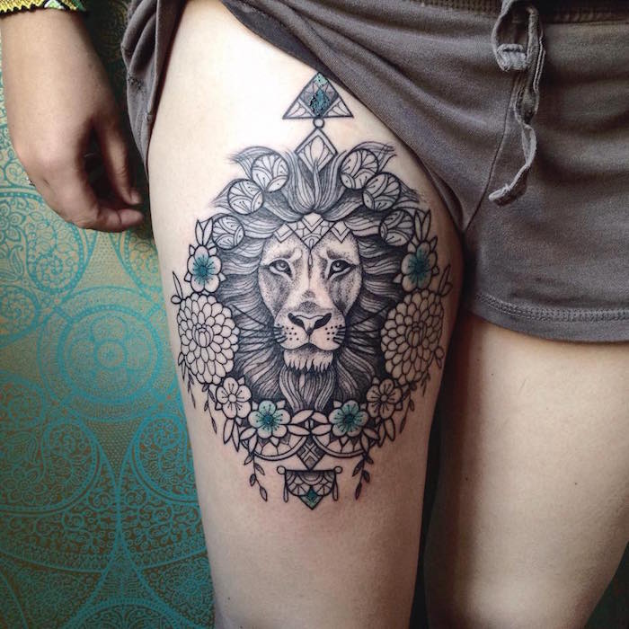 tattoo cuisse cuisse tete de lion idée modele tatouage jambe