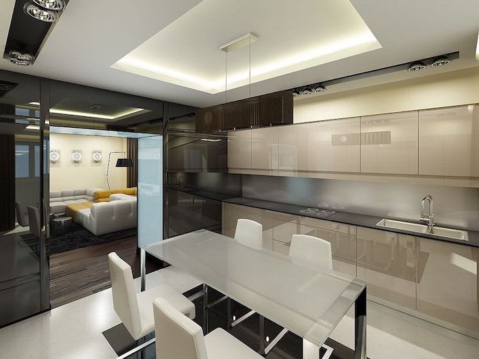 idee deco cuisine, meubles de cuisine beige sans poignées avec comptoir noir, plafond suspendu avec éclairage led