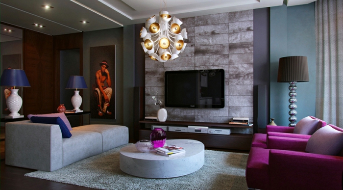 salon cosy, tapis gris, table basse ronde, fauteuils lilas, lampe de sol, tv mural et sofa moderne