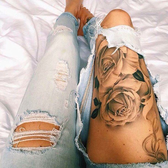 tatouage roses noires sur la cuisse femme