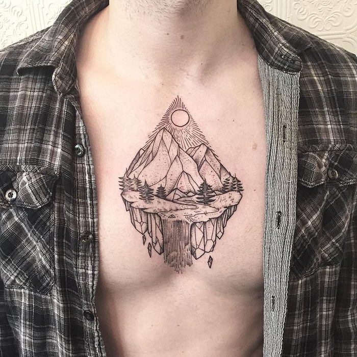 un tatouage geometrique original sur la poitrine représentant un montagne sur une île flottante