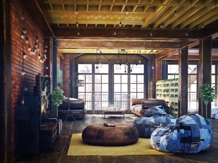 meuble industriel, déco intérieur loft aux murs marron et plancher bois foncé, canapé en cuir marron avec table basse en bois