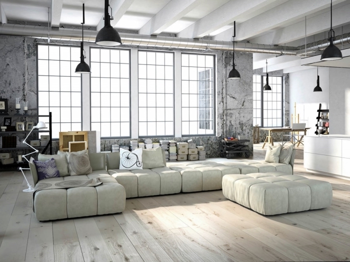 mobilier industriel, chambre loft aux murs gris et plafond blanc avec lampes suspendues noires et plancher en bois clair