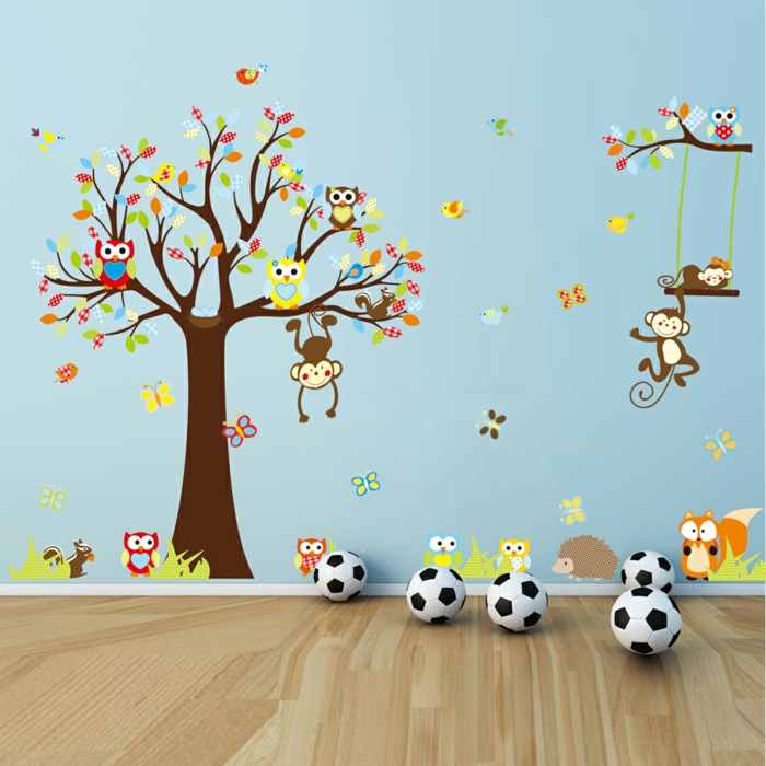 stickers chambre bébé thème forêt avec des arbres avec des singes et des hibous couleur du mur bleu canard