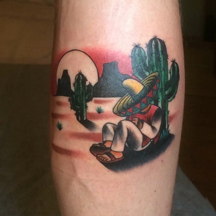 tatouage coloré, paysage exotique, un désert avec des cactus et un homme qui fait la sieste