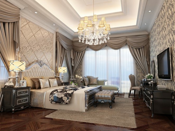 chambre de luxe moderne, grand plafonnier à pampilles, faux plafond lumineux, tv écran plat