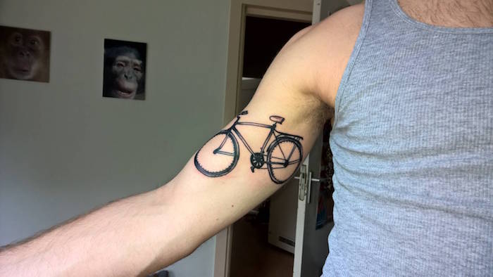 symbole liberté tatouage vélo tattoo fixie sur le bras