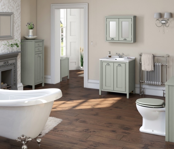 revetement salle de bain, déco plancher en bois avec tapis moelleux en blanc, meubles de bains en bois peints vert pastel