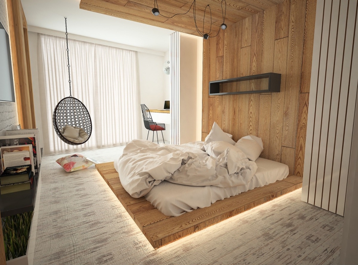 chambre complete adulte en style scandinave avec lit bas et chaise suspendue pour une ambiance cocooning