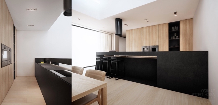 conception moderne de cuisine avec meubles en bois clair et ilot central noir, modèle de plafond suspendu avec éclairage led