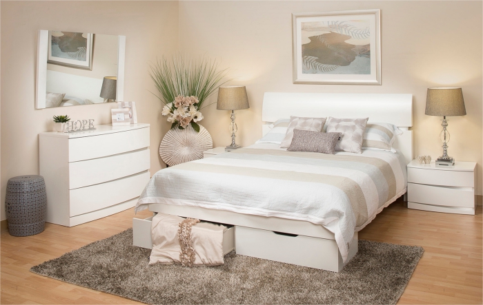 commode chambre adulte de couleur blanc sans poignées avec miroir, grand lit avec tiroirs et table de chevet