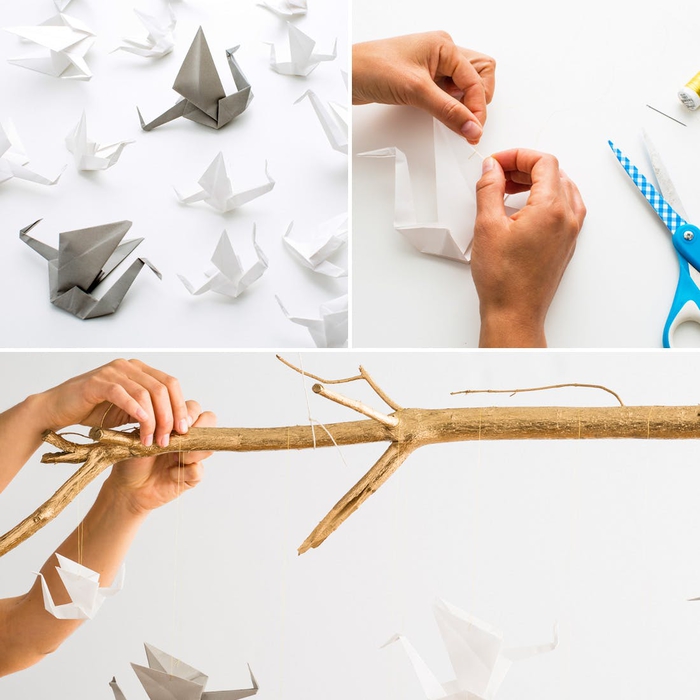 idée déco originale avec des grues en origami traditionnels suspendus à une branche, une déco origami facile à réaliser 