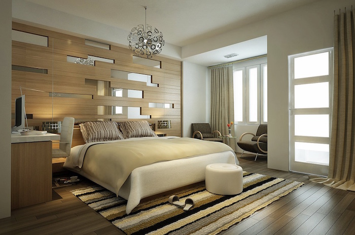 grande chambre aménagée sur plancher en bois mur avec miroir, chambre moderne pour adultes