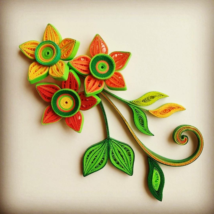 pliage papier original, fleurs en orange et vert, design artistique en couleurs joyeuses