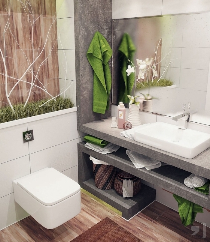 agencement salle de bain nature petite surface avec un meuble en béton, vasque blanche, grand miroir et installation nature