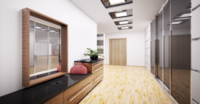 aménagement de couloir en style moderne avec parquet de bois clair et meubles de bois et noir, déco en blanc et bois couloir
