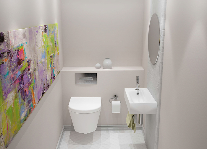 idée d aménagement petite salle de bain 2m2 en blanc avec wc suspendu et une deco murale panneau peinture art abstrait