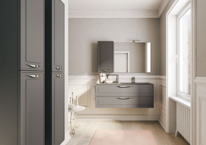 salle de bain gris clair avec meubles gris anthracite et sol imitation parquet beige