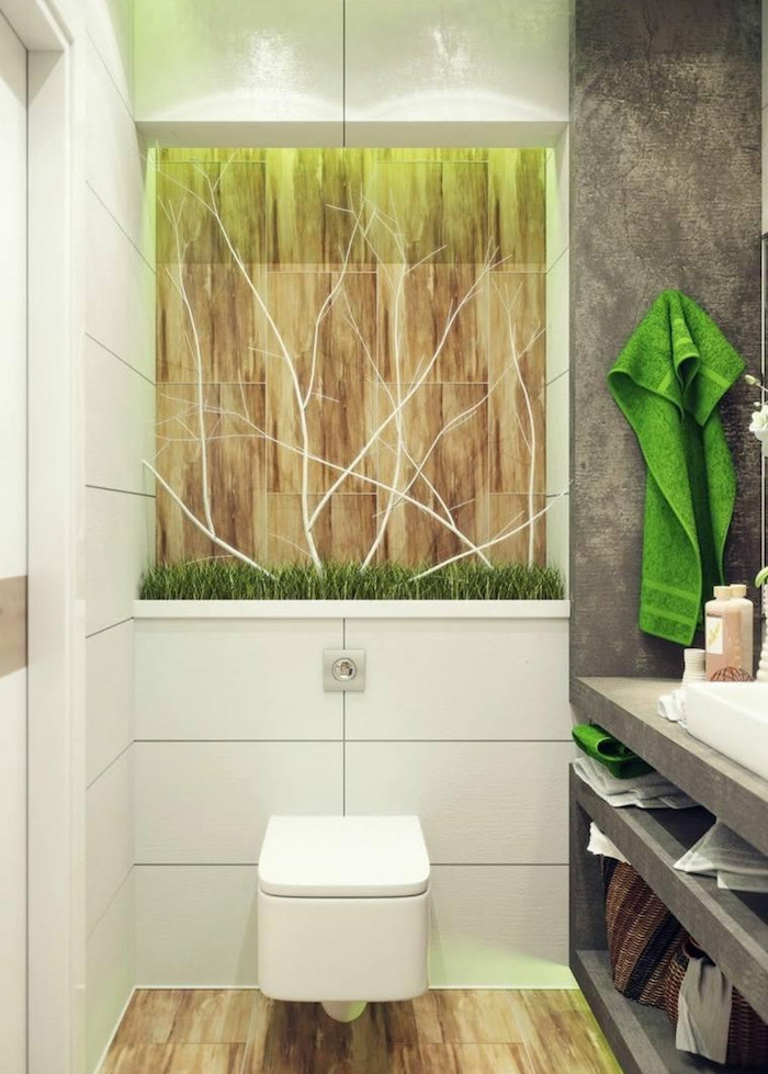decorer ses toilettes style moderne blanc et gros béton avec déco art déco arbre