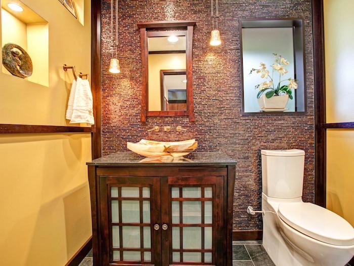 photo deco toilette zen avec meuble lavabo en bois exotique et mur en faience