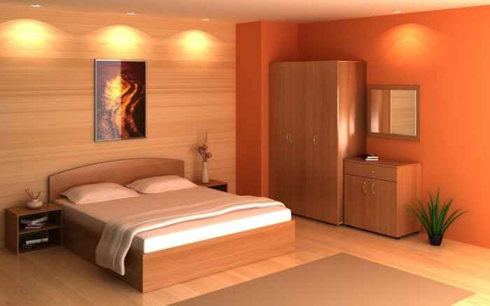 déco feng shui chambre à coucher, lit plateforme, petite plante verte, mur peinte orange