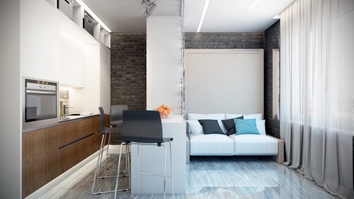 modèle amenagement petit espace avec muret entre la cuisine et la chambre à coucher, design intérieur moderne en blanc et gris