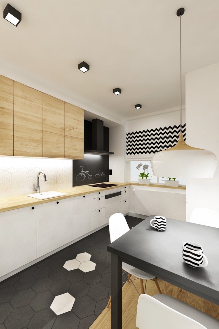 idée comment associer les couleurs neutres dans une cuisine moderne aux murs blancs avec carrelage de sol noir et meubles de bois clair