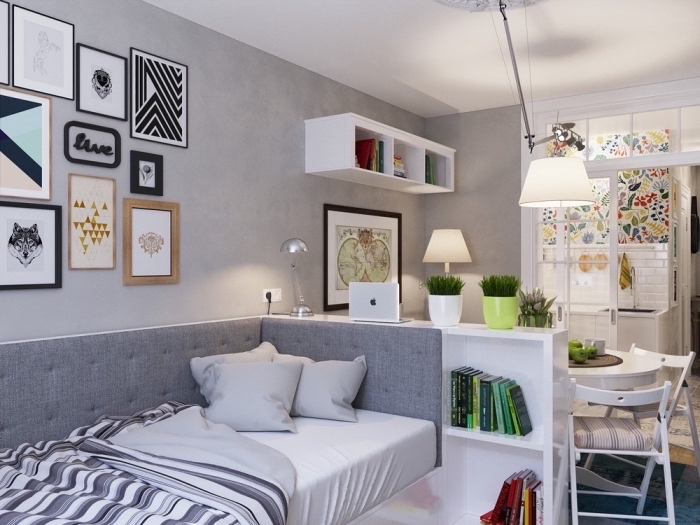 intérieur à design moderne avec meubles blanc et gris, aménagement studio 25m2 avec rangements verticals