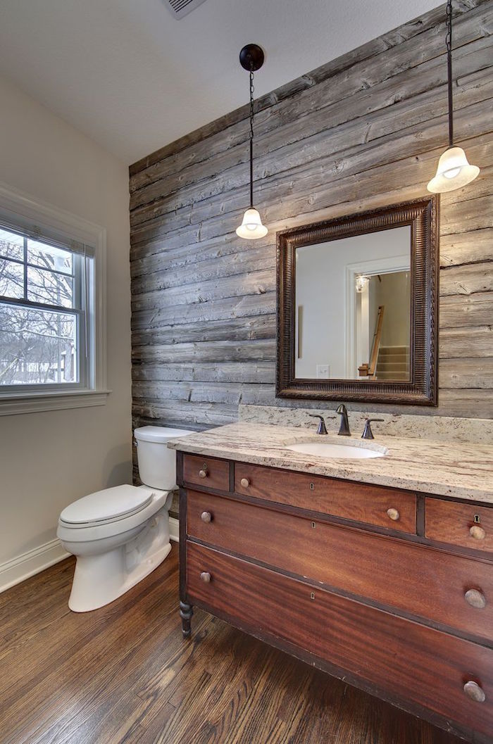 salle de bain rétro style rustique avec mur et meuble lavabo en bois et carrelage imitation parquet