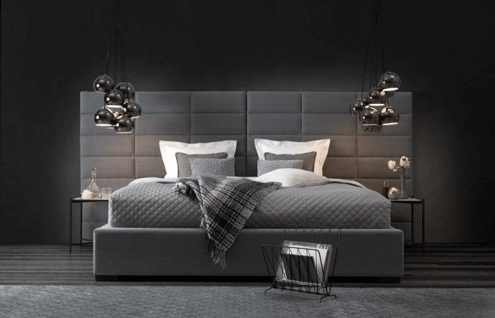 exemple d'aménagement de chambre adulte en look monochrome avec peinture murale en gris foncé et meubles en différentes nuances de gris