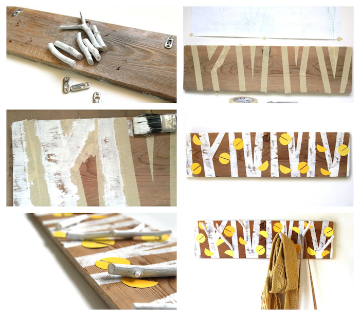 idée comment fabriquer un porte manteau scandinave original en planche de bois avec motif arbre dessiné, feuilles de papier jaune et brindilles pour accrocher un manteau et autres accessoires